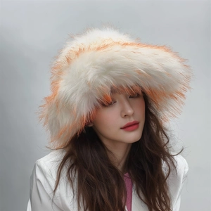 Macro detail of high-volume faux fur bucket hat with white and orange gradient texture