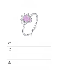 Macro detail of S925 sterling silver ring featuring a 5x7mm pink opal teardrop stone