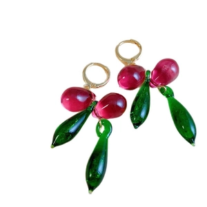 Fashionable cherry-shaped crystal earrings with golden hoops and clear green leaf charms