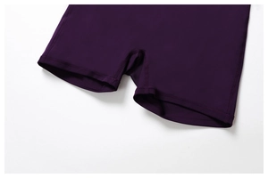 Detail of deep purple yoga shorts featuring high-elastic breathable fabric and flat seams