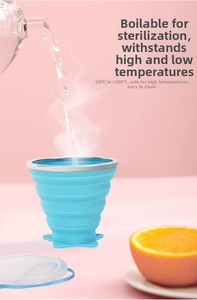 Silicone folding cup showing heat resistance with boiling water and steam
