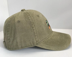Close-up of duck embroidery detail on olive green washed cotton baseball cap