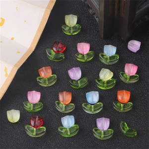 Detailed macro view of colorful glass tulip beads for DIY handmade jewelry crafts