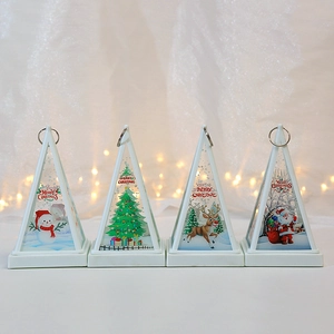 Set of four Christmas lantern ornaments with snowman and reindeer patterns for holiday decor