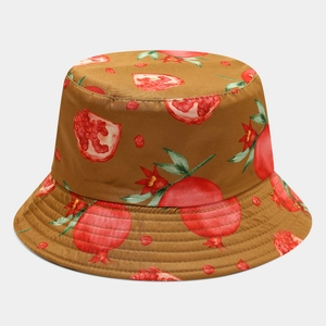 Detail of cotton bucket hat with pomegranate pattern and reinforced brim stitching