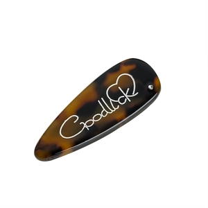 Fermaglio in acetato tartarugato con scritta Goodluck e piccolo strass lucido
