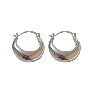 Polished silver U-shaped hoop earrings with a minimalist metallic mirror finish
