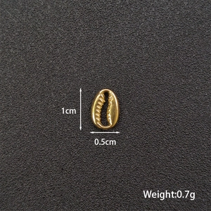 Golden stainless steel shell charm for DIY jewelry with dimension and weight labels