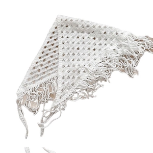 White crochet knit triangular scarf with hollow pattern and long fringe tassels