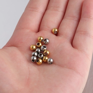 Round 5mm stainless steel spacer beads in gold and silver finish for jewelry making