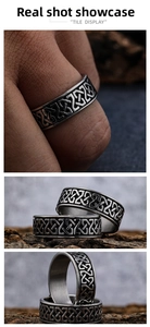 Detailed close-up of vintage Celtic knot stainless steel ring with black engraving