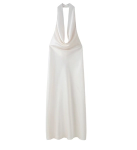 Detail of white satin backless halter midi dress showing glossy fabric texture