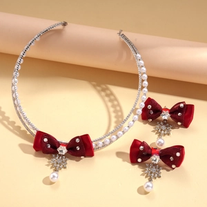 Christmas necklace and earrings set with red velvet bow, silver snowflake, and pearls