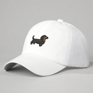 White cotton baseball cap with embroidered dachshund pattern and six-panel crown