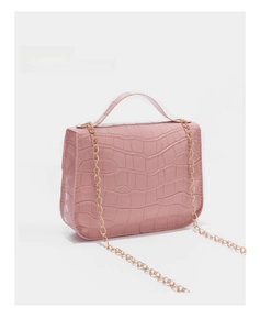 Pink crocodile pattern leather handbag detail with elegant gold chain strap