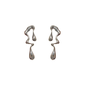 Irregular liquid metal earrings in silver finish featuring a melted molten design style