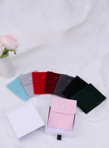 Velvet snap jewelry pouches in multiple colors with elegant white drawer gift box packaging