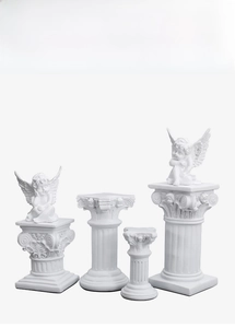 Classical white Nordic Roman columns and winged angel statues for wedding scene display