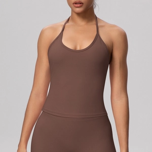 Close-up of brown halter neck sports bra with thin straps and high-stretch fabric