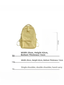 Detailed dimensions of yellow nylon backpack measuring 29x42x13cm weighing 0.35kg