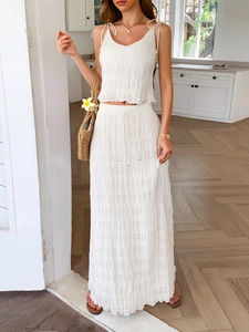 White two-piece set for women featuring a textured drawstring camisole top and matching maxi skirt