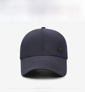Front view of navy mesh baseball cap featuring reinforced brim and metal sports emblem
