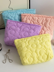 Borse da trucco trapuntate a fiori in blu, rosa, viola e giallo con cerniera lampo