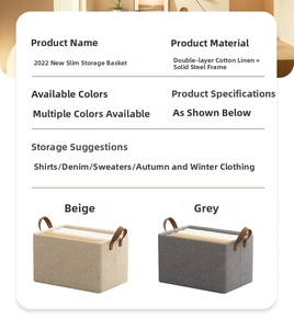 Detail of steel frame storage bins with cotton linen fabric and leather handles