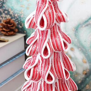 Luminous Christmas tree house ornament with red and white candy stripes and snowy texture