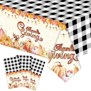Thanksgiving party set with maple pumpkin buffalo plaid tablecloth and napkins