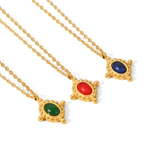 Cross pendant necklaces in gold finish with red, blue, and green semi-precious stones
