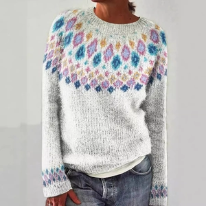 Women's crewneck knit sweater with white base and colorful Fair Isle geometric patterns