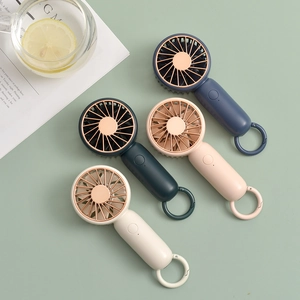 Portable USB mini fan with carabiner hook in four colors for outdoor and desktop use