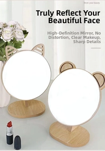 Close-up of minimalist wooden desktop makeup mirrors with cute animal ear designs