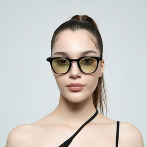 Classic round small frame rivet sunglasses with yellow lenses and black full rim