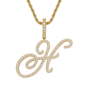 Macro detail of 18K gold H letter pendant with sparkling zircons on a rope chain