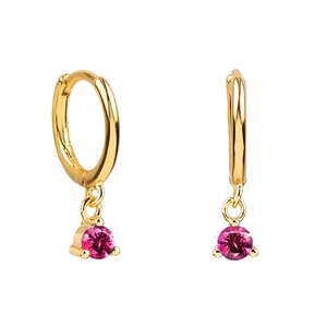 Detail of 925 silver gold-plated hoop earrings with faceted rose red zircon pendants