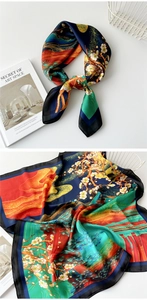 Detailed view of silk square scarf featuring oriental plum blossoms and pagoda patterns