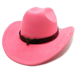 Detail of pink western cowboy hat with a black leather belt and bronze bull head buckle