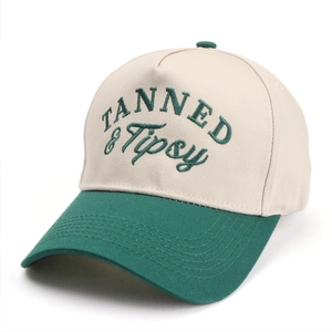 Detail of 3D embroidery on five-panel color-block baseball cap with cotton canvas texture