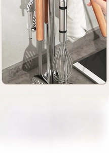 Detailed close-up of 360-degree rotating kitchen tool holder with wooden handles