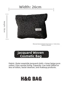 Detail view of black jacquard makeup bag showing 26cm width and 18cm height dimensions
