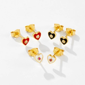 Detailed view of three pairs of S925 silver heart studs in red, black, and white enamel