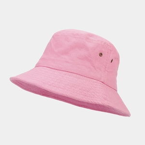 Detail of pink cotton bucket hat featuring side metal eyelets and reinforced stitching