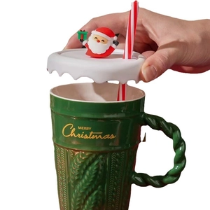 Green ceramic Christmas tree mug with knitted texture and Santa lid including straw
