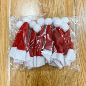 Bulk pack of 10 mini red and white non-woven Christmas lollipop hats in clear bag