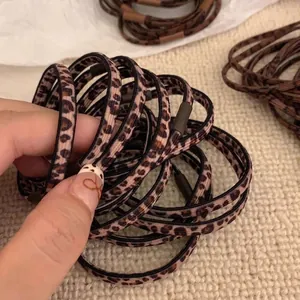Elastic leopard print hair ties with durable connectors for women's ponytails