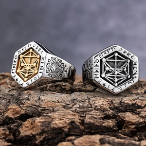 Men's Viking stainless steel rings with mystic rune engraving on a rustic bark background