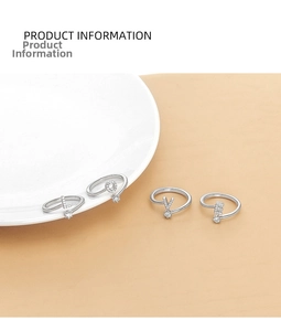 Detail of four-piece S925 silver LOVE letter rings set with micro-paved sparkling crystals