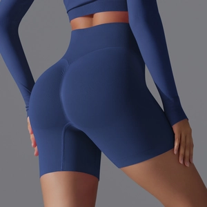 Detailed back view of high waist seamless yoga shorts with peach contouring texture
